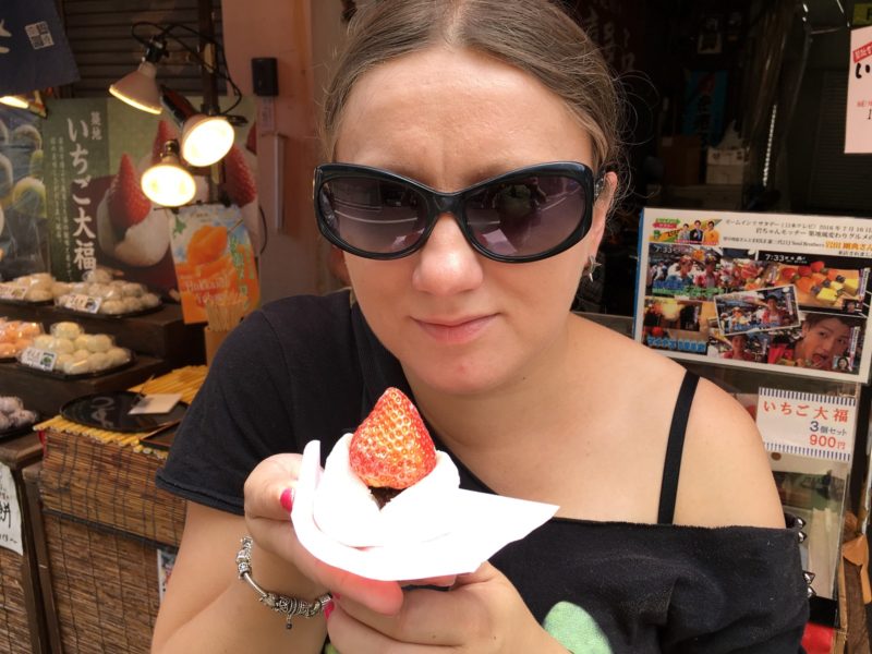 Eating Japanese strawberry daifuku (ichigo daifuku)